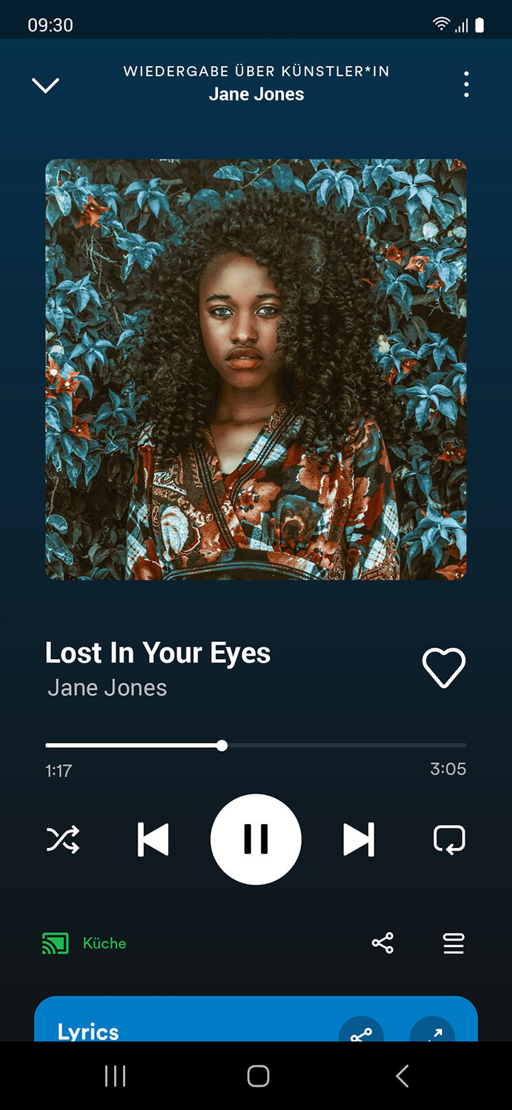 Music playback in the Spotify app on a smartphone, with an example artist shown.