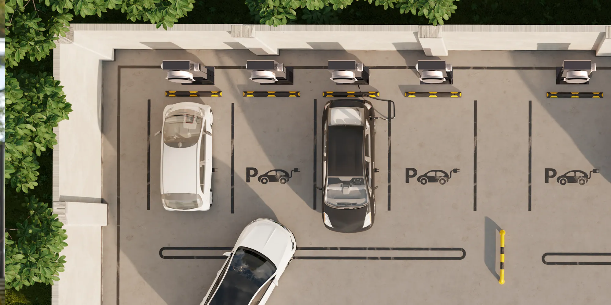 Ladepark mit mehreren TECHNIVOLT-Ladestationen aus der Vogelperspektive – einige Elektroautos laden gleichzeitig.